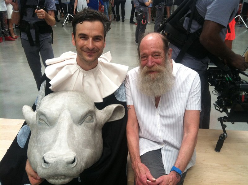 Marcel Dzama with artist Lawrence Weiner on the set of Jay Z's "Picasso Baby" performance at Pace Gallery, New York City. (2013)